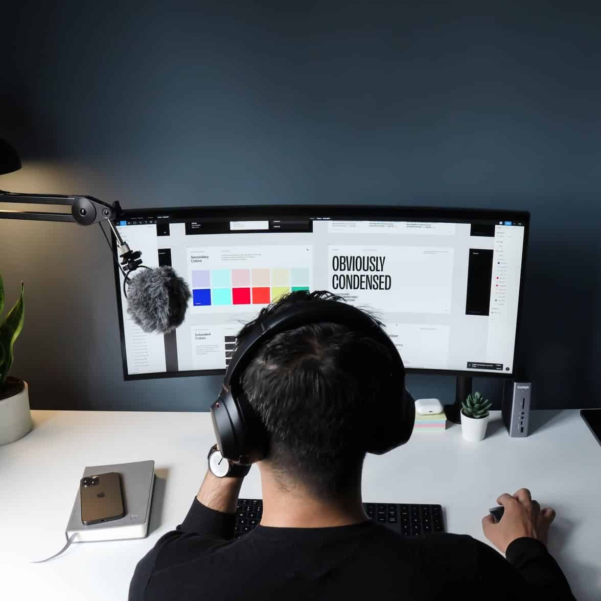 a designer working on a brand strategy design on his computer